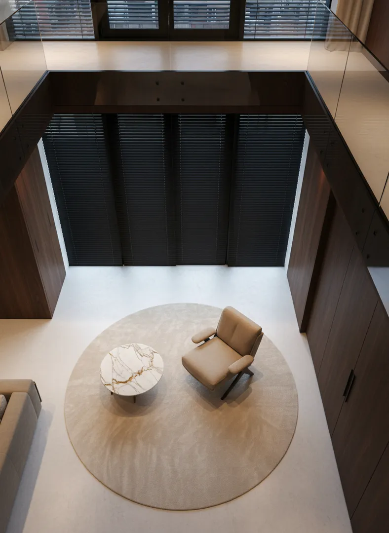 Italian modern walnut armchair top-down view — deep bullnose seat, walnut A-frame legs on circular rug