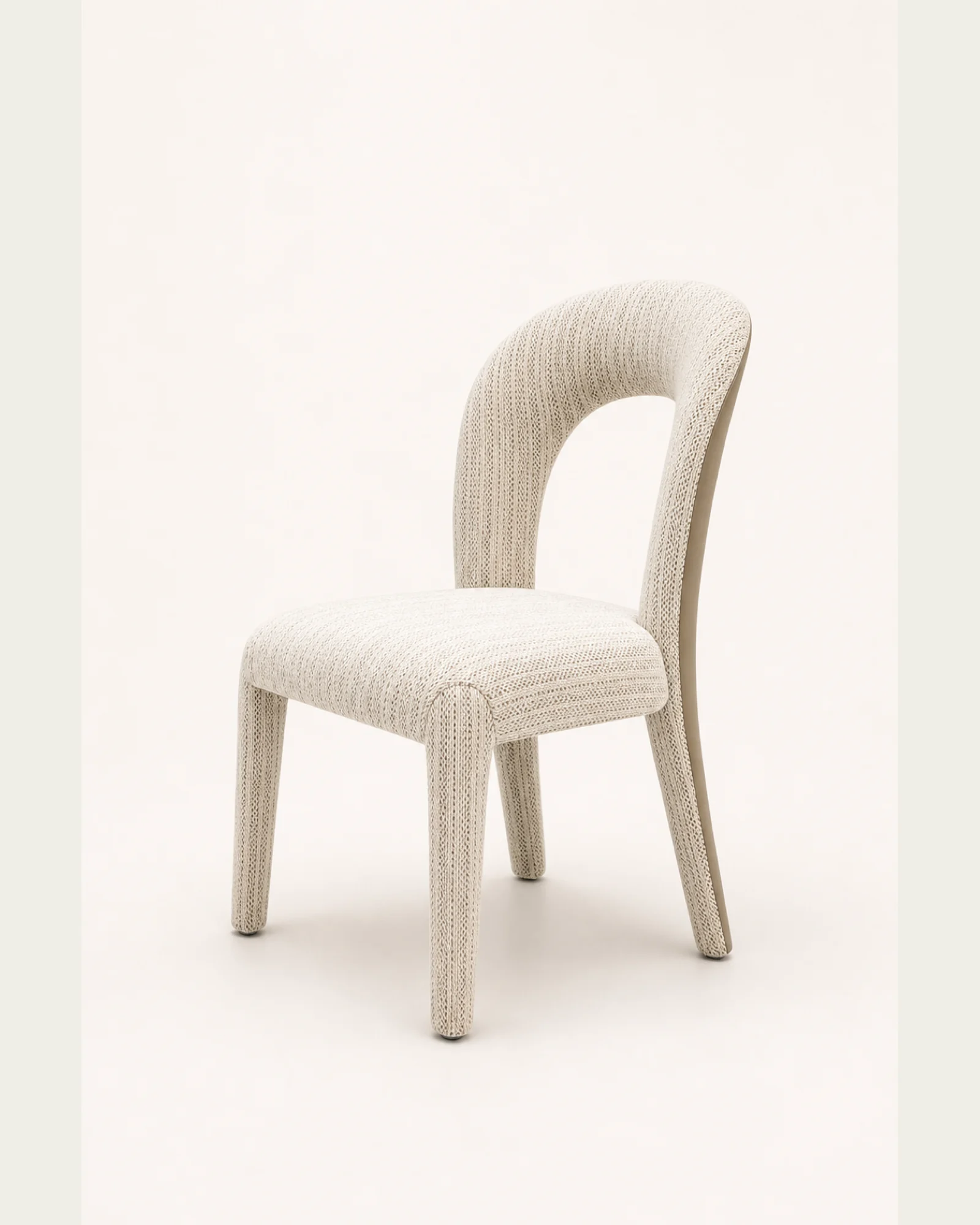 Ivory loop-back upholstered dining chair front 45 degree studio view | ROBERT CASA