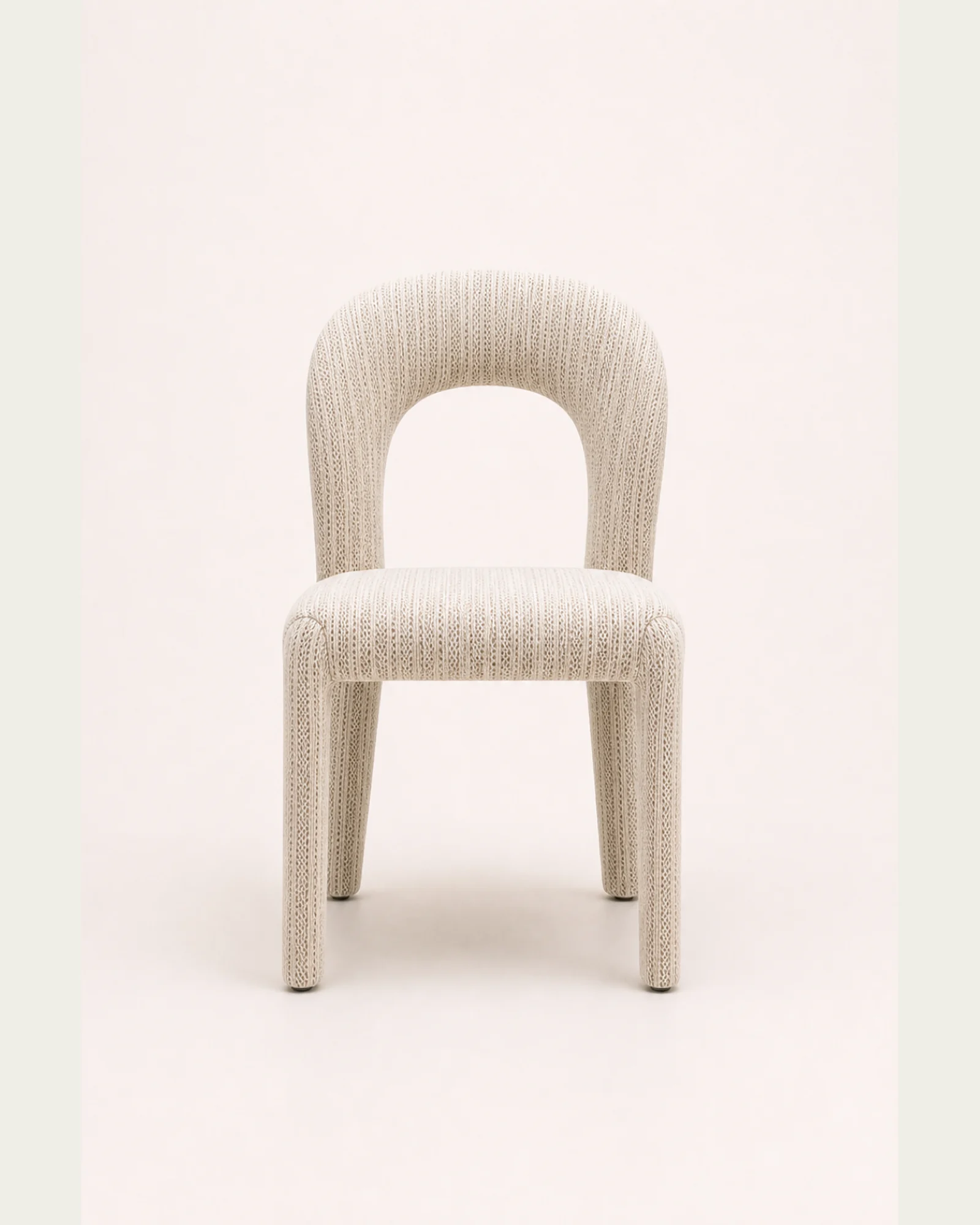 Ivory loop-back upholstered dining chair centered front studio view | ROBERT CASA