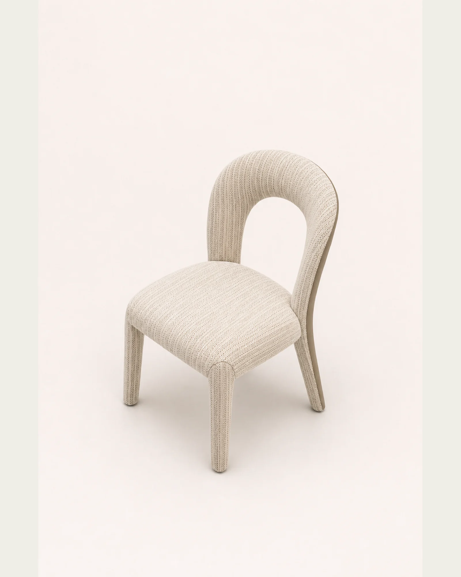 Ivory loop-back upholstered dining chair opposite 45 degree studio view | ROBERT CASA